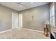 Neutral bedroom featuring ceiling fan, carpet, and base molding at 2008 Winter Wind St, Las Vegas, NV 89134