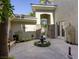 Serene courtyard featuring a decorative fountain, providing a tranquil outdoor space for relaxation at 2008 Winter Wind St, Las Vegas, NV 89134