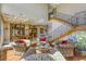 Elegant living room features coffered ceilings, grand staircase, and view into the dining area at 2008 Winter Wind St, Las Vegas, NV 89134