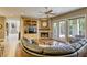 Cozy living room features fireplace, ceiling fan and access to outdoor living at 2008 Winter Wind St, Las Vegas, NV 89134