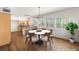 Dining room with chandelier lighting, lots of sunlight and eat-in kitchen view at 215 Sunlight Peak St, Henderson, NV 89012