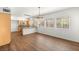 Bright dining room with chandelier lighting and eat-in kitchen at 215 Sunlight Peak St, Henderson, NV 89012