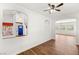 Inviting entryway with wood floors, blue door, and chandelier at 215 Sunlight Peak St, Henderson, NV 89012