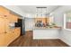 Kitchen with stainless steel appliances, granite countertops, and ample cabinet space at 215 Sunlight Peak St, Henderson, NV 89012