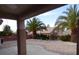 Covered patio overlooking a low maintenance backyard with desert landscaping at 2156 Eagle Sticks Dr, Henderson, NV 89012