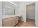 Bathroom vanity with large mirror, lighting, and sink at 2156 Eagle Sticks Dr, Henderson, NV 89012