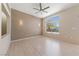 Bedroom featuring laminate wood flooring, a ceiling fan, and natural light at 2156 Eagle Sticks Dr, Henderson, NV 89012
