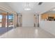 Open-concept dining room with sliding glass doors and laminate flooring at 2156 Eagle Sticks Dr, Henderson, NV 89012