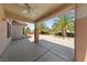 Spacious covered patio with ceiling fan and views of the backyard at 2156 Eagle Sticks Dr, Henderson, NV 89012