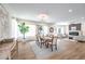 Bright dining area with modern furnishings and sliding glass door access to the backyard at 2581 Terrytown Ave, Henderson, NV 89052