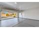Spacious garage with a clean, sealed concrete floor and an automatic door, offering ample parking and storage at 2581 Terrytown Ave, Henderson, NV 89052