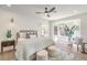 Bright main bedroom with plenty of sunlight, ceiling fan, accent wall, and ample seating at 2581 Terrytown Ave, Henderson, NV 89052