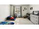 Well-lit bedroom featuring a neutral palette, window and carpeted floors at 2606 S Durango Dr # 276, Las Vegas, NV 89117