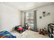 Bright bedroom with a large window, carpeted floors, and playful decor at 2606 S Durango Dr # 276, Las Vegas, NV 89117