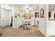 Open floor plan with a dining area featuring stylish accents and bright, neutral paint at 2606 S Durango Dr # 276, Las Vegas, NV 89117