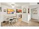 Bright dining area with a modern light fixture, adjacent to a cozy kitchen space at 2606 S Durango Dr # 276, Las Vegas, NV 89117