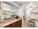 Open layout showing the kitchen flowing into the dining and living spaces at 2606 S Durango Dr # 276, Las Vegas, NV 89117