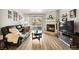 Inviting living room with cozy fireplace, sliding glass doors, and modern flooring at 2606 S Durango Dr # 276, Las Vegas, NV 89117