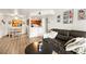 Inviting living room with wood floors, view of dining area, and comfortable seating at 2606 S Durango Dr # 276, Las Vegas, NV 89117