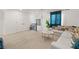 Cozy upstairs living area with plush carpeting and a comfortable sofa at 2624 Stanhurst Ave, North Las Vegas, NV 89081