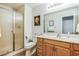 Bathroom featuring a glass enclosed shower, toilet, and vanity with ample counter space at 271 Sunshine Springs Ct, Henderson, NV 89014