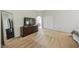 Spacious bedroom featuring a large dresser, full-length mirror, neutral carpeting, and ensuite bathroom access at 271 Sunshine Springs Ct, Henderson, NV 89014