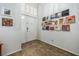 Inviting entryway featuring tiled flooring and curated wall art, creating a welcoming atmosphere at 271 Sunshine Springs Ct, Henderson, NV 89014