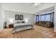 Large main bedroom with carpet, vaulted ceiling, sitting area, and natural light at 271 Sunshine Springs Ct, Henderson, NV 89014