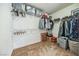 Well-organized walk-in closet with ample storage space, shelving, and hanging rods for clothes and accessories at 271 Sunshine Springs Ct, Henderson, NV 89014