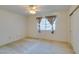 Cozy bedroom featuring a window, ceiling fan, and neutral carpet, providing a comfortable space to relax at 2851 S Valley View Blvd # 1161, Las Vegas, NV 89102