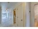 Hallway with natural lighting leading to various rooms in the home at 2851 S Valley View Blvd # 1161, Las Vegas, NV 89102