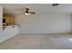Living room with ceiling fan and breakfast bar to the kitchen at 2851 S Valley View Blvd # 1161, Las Vegas, NV 89102