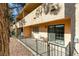 Private patio with sliding glass door and black iron railing, perfect for outdoor relaxation at 2851 S Valley View Blvd # 1161, Las Vegas, NV 89102