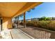 Covered patio area with decorative iron fence overlooking a landscaped yard, offering a tranquil outdoor retreat at 2851 S Valley View Blvd # 1161, Las Vegas, NV 89102