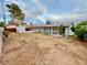 Large backyard with room to customize and enclosed patio with a sunshade at 3037 Holly Hill Ave, Las Vegas, NV 89104