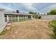 Spacious backyard with an enclosed patio, garden area and block perimeter at 3037 Holly Hill Ave, Las Vegas, NV 89104