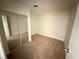 Bedroom featuring neutral carpet, white walls, a window with blinds, and closet at 3037 Holly Hill Ave, Las Vegas, NV 89104