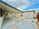 A large covered patio area with ample space for entertaining and outdoor activities, plus a storage shed at 3037 Holly Hill Ave, Las Vegas, NV 89104