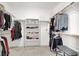 Spacious walk-in closet featuring ample hanging space and shelving at 3136 Mossfield Ave, Henderson, NV 89052