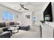 Cozy loft area with comfortable seating, natural light, and entertainment center perfect for relaxation at 3136 Mossfield Ave, Henderson, NV 89052