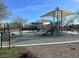 A playground with swings, slides, and play equipment, fostering a safe place for outdoor play at 3136 Mossfield Ave, Henderson, NV 89052