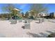 A playground with play equipment and benches, creating a fun space for children and families at 3136 Mossfield Ave, Henderson, NV 89052