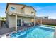 Backyard featuring a swimming pool, covered patio, seating, and a pergola at 3136 Mossfield Ave, Henderson, NV 89052