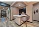 Home wet bar with seating and modern finishes at 33 Desert Juniper Ln, Henderson, NV 89011