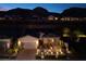 Charming single-story home with a well-manicured front yard and a two-car garage at 33 Desert Juniper Ln, Henderson, NV 89011