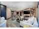 Comfortable living room with fireplace, mounted TV, and stylish decor at 33 Desert Juniper Ln, Henderson, NV 89011