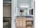 Bathroom features a large mirror, vanity with stool, and walk-in shower at 330 Rancho Cir, Las Vegas, NV 89107