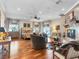 Spacious main bedroom with hardwood floors, a sitting area with fireplace, and French doors to outdoor living area at 330 Rancho Cir, Las Vegas, NV 89107