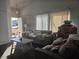 Bright living room with plush seating, a modern coffee table, and great natural light at 3512 Trilogy Dr, Las Vegas, NV 89108
