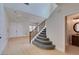 Carpeted Staircase leading to the second floor with a partial bathroom view at 3809 Alpine Track Ave, North Las Vegas, NV 89032